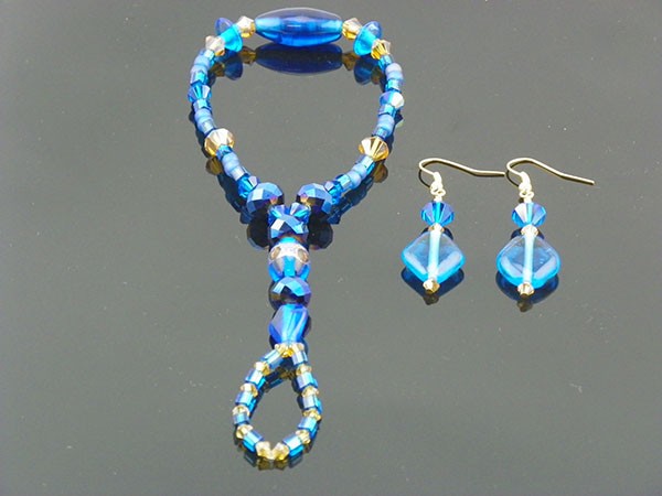 Blue Glass & Faux Gold Crystal Set